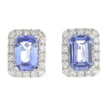 A pair of sapphire and diamond cluster earrings.Total sapphire weight 1.26cts.Total diamond weight