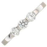 A platinum brilliant-cut diamond three-stone ring.Total diamond weight 0.30ct,