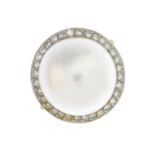 A mabe pearl and diamond dress ring.