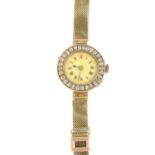 A lady's early 20th century 9ct gold diamond watch.Estimated total diamond weight 0.85ct.Import