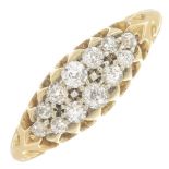 An early 20th century 18ct gold old-cut diamond dress ring.Estimated total diamond weight 0.40ct,