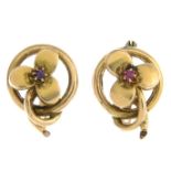 A pair of early 20th century ruby floral earrings.Length 1.7cms.