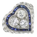 A sapphire and diamond heart-shape cluster ring.Estimated total diamond weight 2cts,