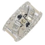 A diamond dress ring.Estimated total diamond weight 0.70ct.Ring size Q1/2.