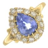 A sapphire and diamond cluster ring.Sapphire calculated weight 1.40cts,
