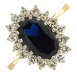 A sapphire and diamond cluster ring.Sapphire calculated weight 2.80cts,