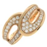 An 18ct gold diamond dress ring.Total diamond weight 0.78ct,