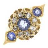 An early 20th century 18ct gold sapphire and diamond cluster ring.Estimated total diamond weight