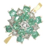 An 18ct gold emerald and diamond cluster ring.Estimated total diamond weight 0.20ct.