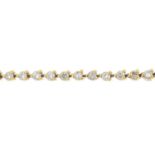 A brilliant-cut diamond line bracelet.Estimated total diamond weight 2.50cts.Stamped 18k.Length