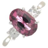 An 18ct gold pink spinel and diamond three-stone ring.Spinel calculated weight 1.71cts,