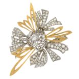 A diamond abstract brooch.Estimated total diamond weight 1.30cts.Length 5.5cms.