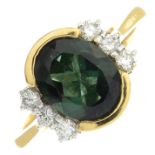A green tourmaline and diamond ring.Tourmaline calculated weight 1.50cts,