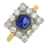 A mid 20th century 18ct gold and platinum sapphire and diamond cluster ring.Estimated total diamond