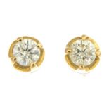 A pair of brilliant-cut diamond stud earrings.Estimated total diamond weight 0.40ct,