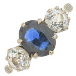 An 18ct gold sapphire and diamond three-stone ring.Sapphire calculated weight 0.95ct,