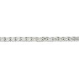 A diamond line bracelet.Estimated total diamond weight 3cts,
