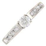 A brilliant-cut diamond dress ring.Total diamond weight 0.65ct,