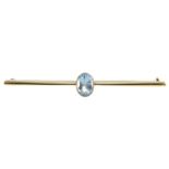 An early 20th century 15ct gold aquamarine bar brooch.Stamped 15C.Length 5.8cms.