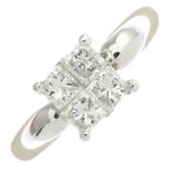 A diamond cluster ring.Estimated total diamond weight 0.90ct,