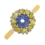 An 18ct gold sapphire and 'coloured diamond' cluster ring.Sapphire calculated weight 0.49ct,