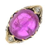 A Burmese ruby cabochon and diamond dress ring.Verbal from GCS,