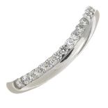A platinum diamond ring.Diamond weight 0.22ct.Hallmarks for London, 2006.Ring size M.