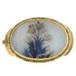 A 19th century gold dendritic agate clasp.Estimated dimensions of agate 19 by 13mms.Length 2.5cms.