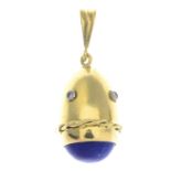 A lapis lazuli and diamond egg pendant.