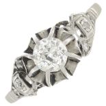 A diamond ring with diamond set shoulders.Estimated total diamond weight 0.50ct,