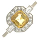 A yellow sapphire and diamond cluster ring.Sapphire calculated weight 1ct,