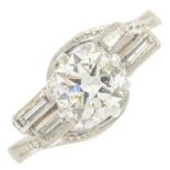 A vari-cut diamond dress ring.Principal diamond estimated weight 0.80ct,