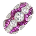 A diamond and ruby dress ring.Estimated total diamond weight 1.25cts,