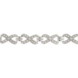 A 9ct gold diamond bracelet.Estimated total diamond weight 2cts.Import marks for Sheffield.Length