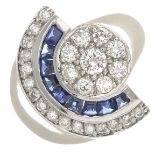 A diamond and sapphire dress ring.Estimated total diamond weight 1ct,