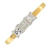 An 18ct gold diamond three-stone ring.Estimated total diamond weight 0.50ct,