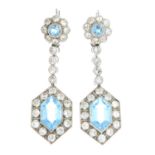 A pair of aquamarine and diamond earrings.Total principal aquamarine calculated weight 4.80cts,