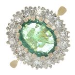 An 18ct gold emerald and diamond cluster ring.Emerald calculated weight 1.24cts,