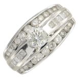 An 18ct gold brilliant-cut and square-shape diamond dress ring.Total diamond weight 1.50cts.