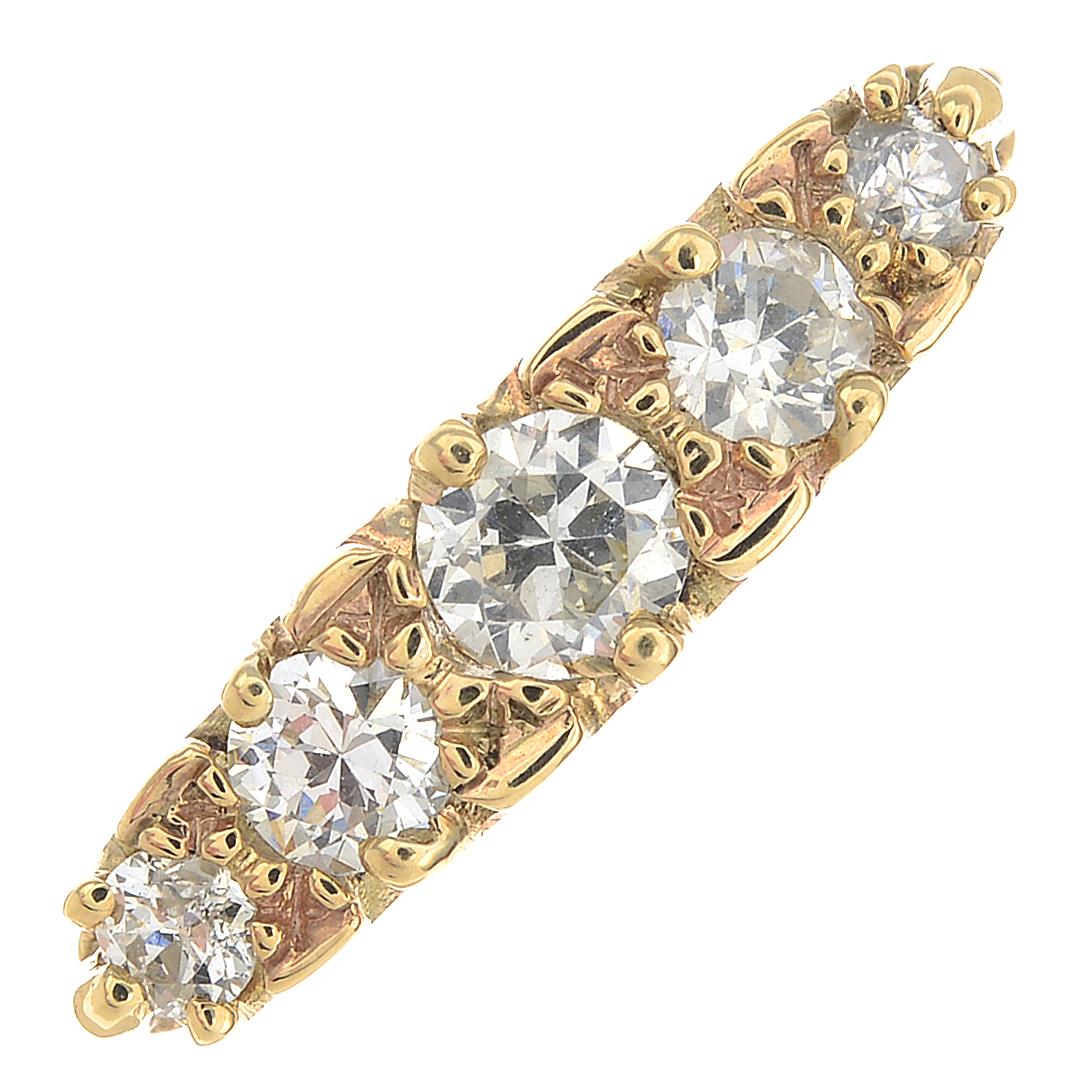 A 9ct gold diamond five-stone ring.Estimated total diamond weight 0.40ct.Hallmarks for London,