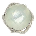 A moonstone and diamond dress ring.Moonstone calculated weight 24.02cts,