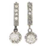 A pair of diamond drop earrings.Estimated total diamond weight 0.70ct,