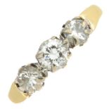 A brilliant-cut diamond three-stone ring.Estimated total diamond weight 0.65ct,