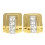 A pair of diamond geometric earrings.Estimated total diamond weight 0.80ct.Stamped 14K.