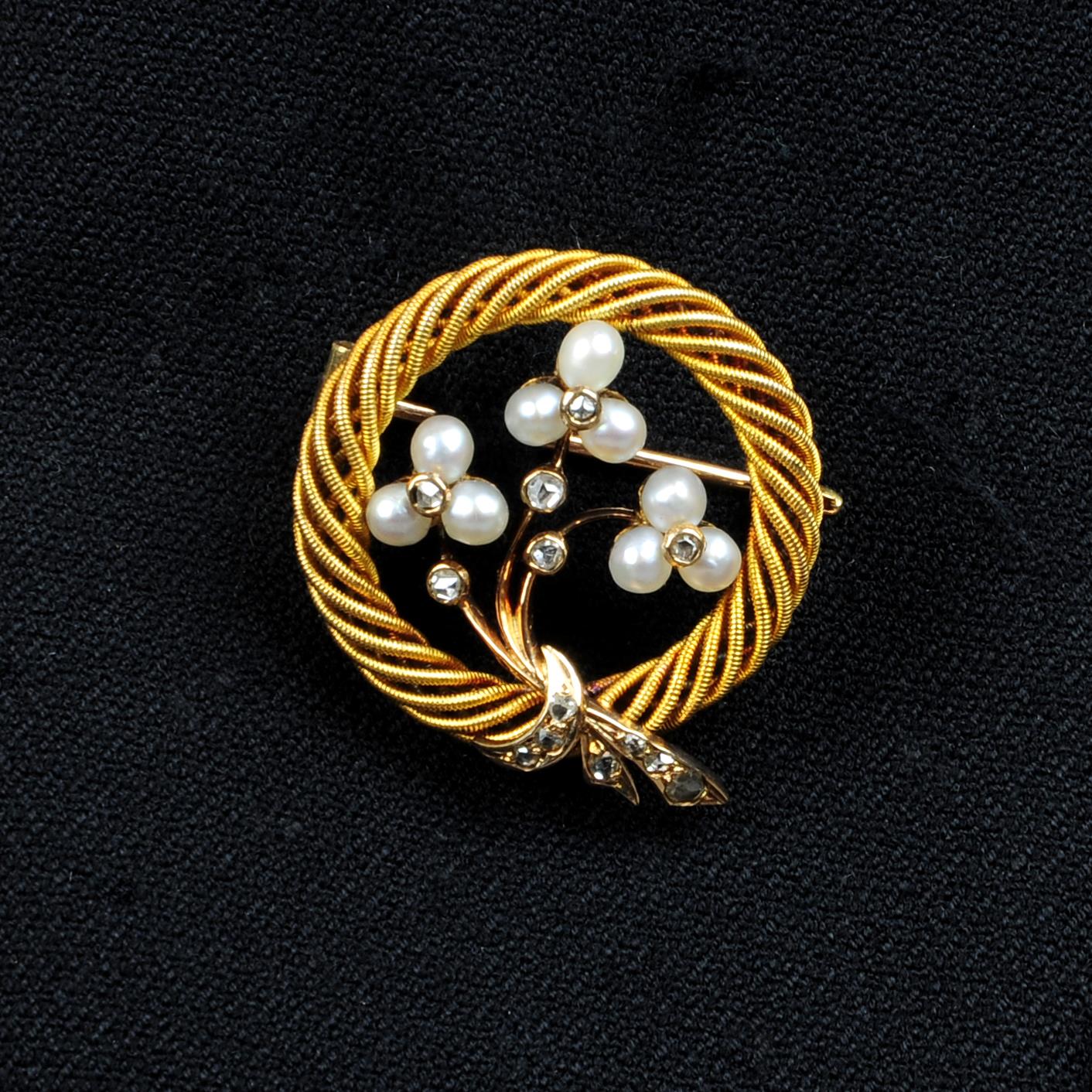 A late 19th century Austrian 18ct gold seed pearl and rose-cut diamond floral wreath brooch. - Image 4 of 5