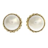 A pair of mabe pearl earrings.Approximate dimensions of one mabe pearl 8.2mms.