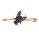 An early 20th century gold, ruby, sapphire, diamond and rock crystal insect brooch.Length 4.1cms.