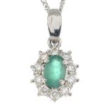 An 18ct gold emerald and diamond pendant,