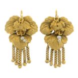 A pair of early 20th century seed pearl floral earrings.One seed pearl deficient.