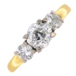 An 18ct gold diamond three-stone ring.Estimated total diamond weight 1.30cts,
